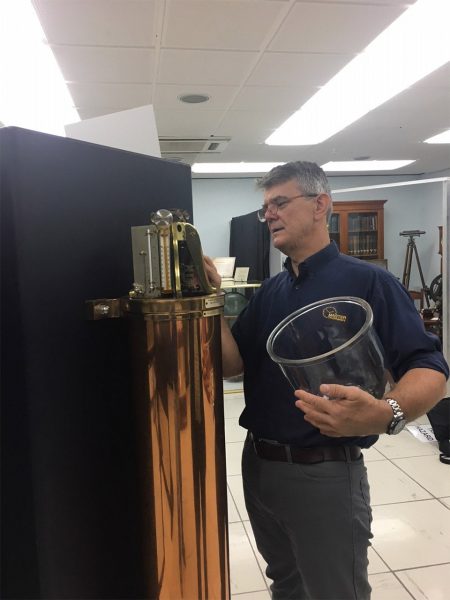 Andrew Markerink inspects a Shortt Synchronome. Image Credit: Paul Fisher