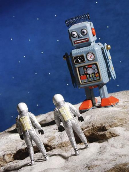 Astronauts with big toy robot. Image Credit: Routledge