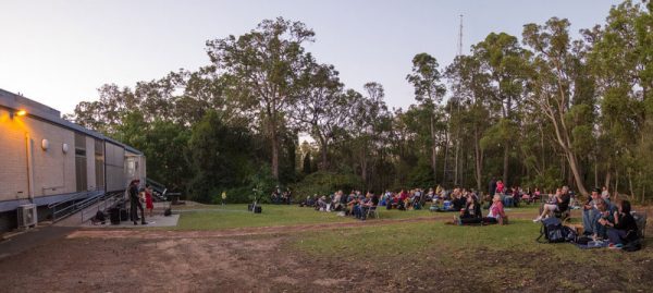 Attendees listening to the live band at the 2016 Summer Lecture presentation. Image Credit: Geoff Scott