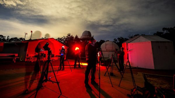 Attendees taking photos of the night sky on a nightscapes workshop. Image Credit: Matt Woods