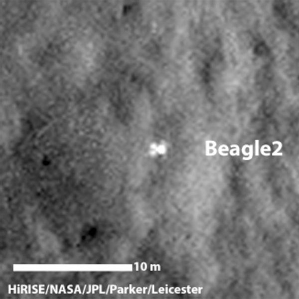 Image from NASA's Mars Reconnaissance Orbiter. The Beagle 2 lander is seen partially deployed on the surface, showing that the entry, descent and landing sequence worked and it did indeed successfully land on Mars on Christmas Day 2003. Image Credit: HiRISE/NASA/JPL Cal-tech/Parker/Leicester