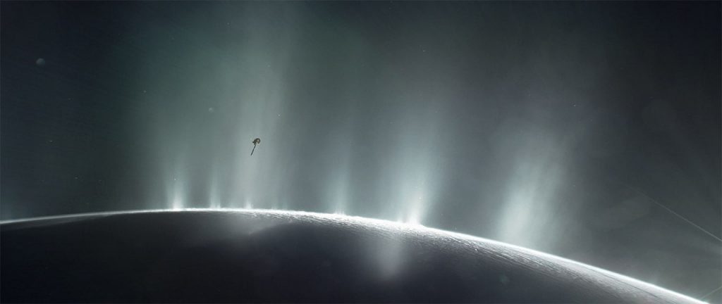 This illustration shows the Cassini spacecraft diving through a plume of material venting from Saturn’s moon, Enceladus. Credit: NASA and JPL-Caltech