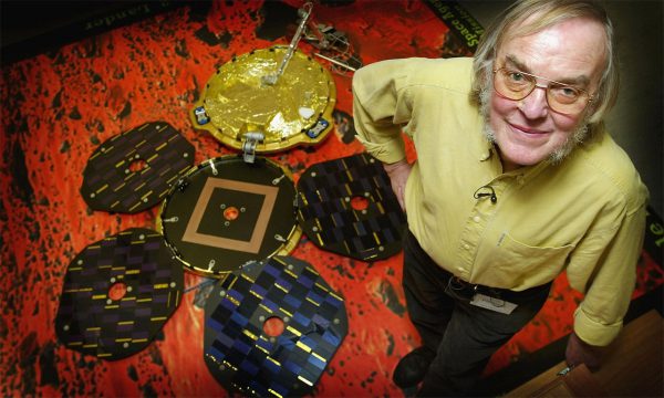 Planetary scientist and Leader of the Beagle 2 Project, Colin Pillinger stands next to a scale model of the Beagle 2 lander. Colin sadly died before Beagle 2 was found by NASA’s Mars Reconnaissance Orbiter. Image Credit: The Verge