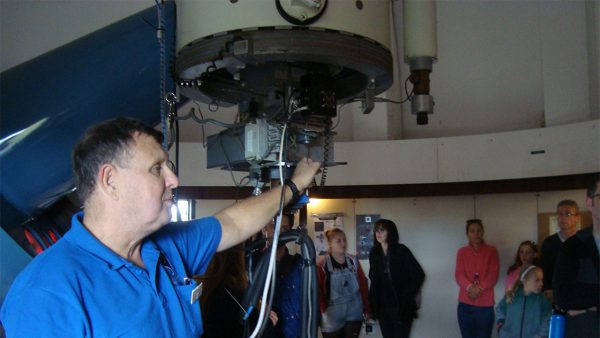 Ed talking about the lowell telescope. Image Credit: Geoff Scott