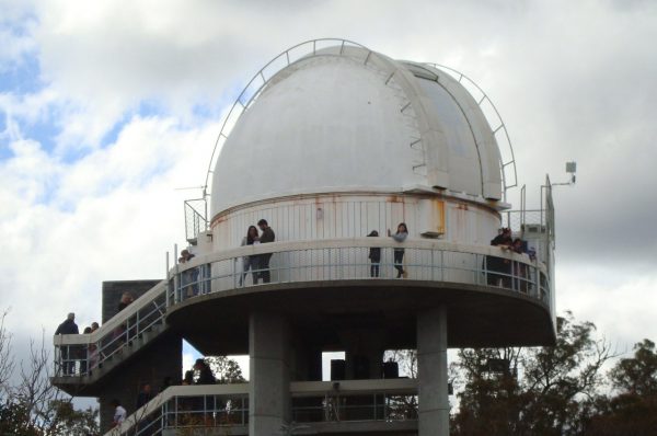 Group walking around lowell dome. Image Credit: Geoff Scott