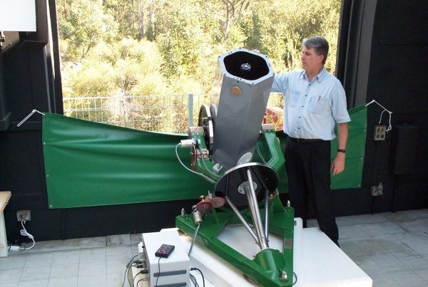 Dr Jamie Biggs with the Mike Candy Telescope. Image Credit: Perth Observatory
