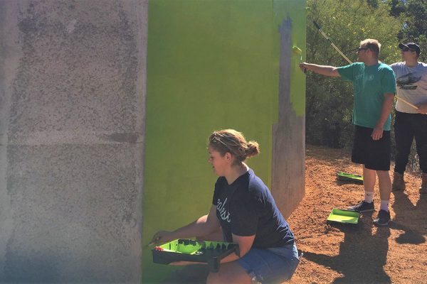 Hayley Fraser-Easton, James Grylls and Josh Crisp from Kalamunda Rotaract painting the outside of Worl Wangkiny. Image Credit: Edwin Sitt