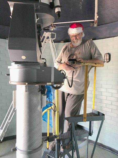 He's checking the Meade 16" telescope twice!. Image Credit: Stranger family