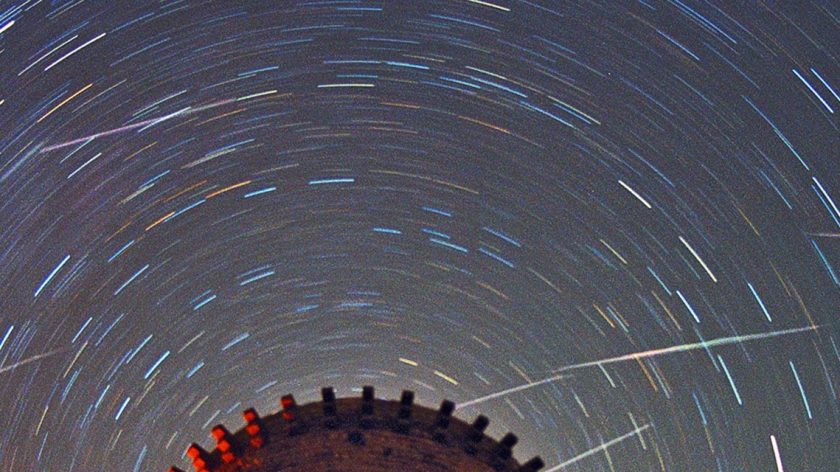 Leonids above Torre de la Guaita banner