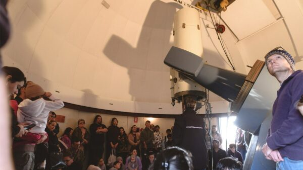 Patrons being shown the Lowell Telescope. Image Credit: Matt Woods