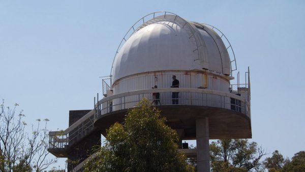 People walking around the Lowell Dome. Image Credit: Geoff Scott