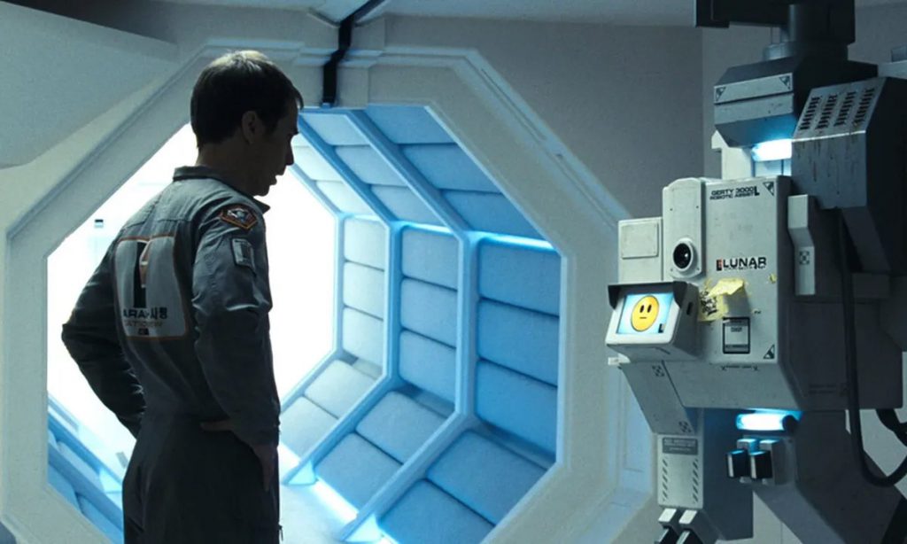Sam (Sam Rockwell) talks to the artificial intelligence unit GERTY (voiced by Kevin Spacey). Image Credit: PR Handout