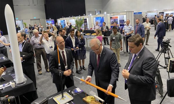 Australian Prime Minister Scott Morrison inspects a miniature test rocket at today's space forum in Adelaide. Image Credit: Jim Plouffe