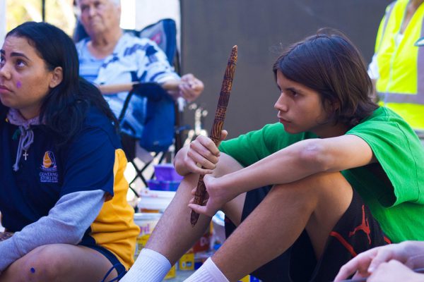 Follow the Dream students from Governor Stirling Senior High School listening to an Indigenous Elder. Image Credit: Edwin Sitt