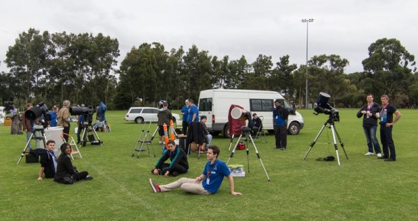 The Perth Observatory Volunteers patiently waiting for the crowds to show and the clouds to go. Image credit: Geoff Scott