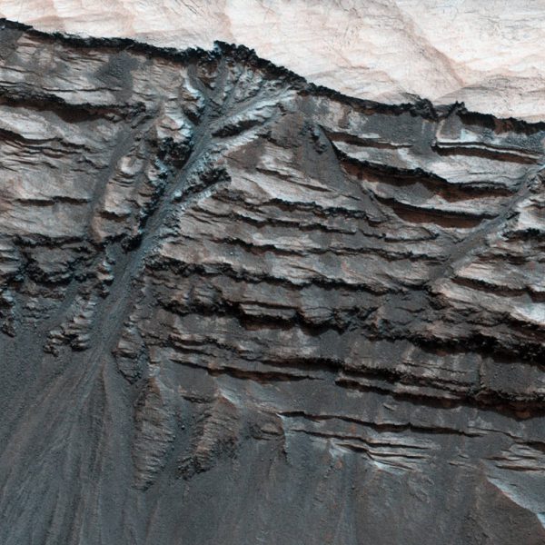 Figure 4: Water gully or landslide? Gullies cut through sedimentary layers in Terby Crater. Image Credit: JPL/NASA