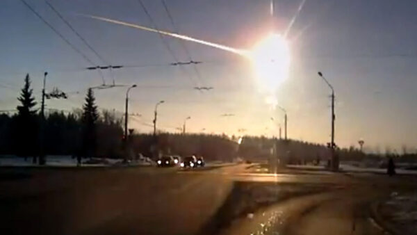 The Chelyabinsk meteor was seen as a fireball, caught here on a car's dashboard camera. Image Credit: RIA NOVOSTI/Science Photo Library