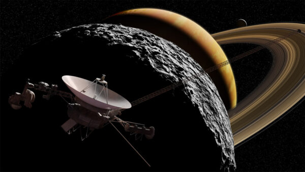The Voyager Spacecraft flying past Saturn and it's Moon Iapetus. Image Credit: Oxford University