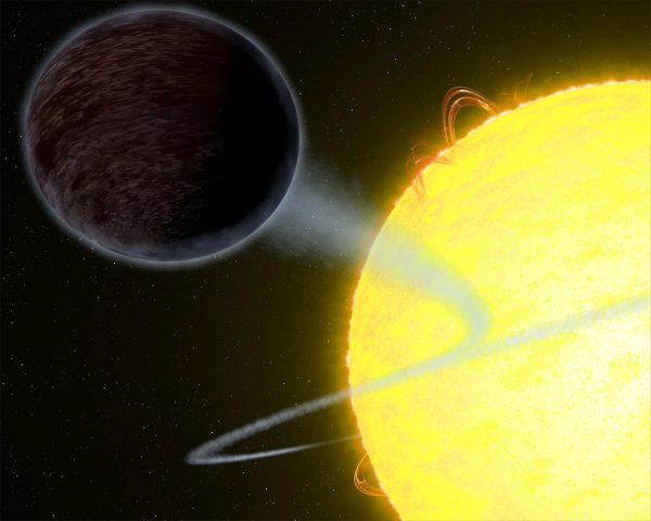 An artist's rendition of the 'hot Jupiter' WASP-12b, a pitch-black world that absorbs at least 94 percent of the visible starlight striking its atmosphere. Image Credit: NASA, ESA, and G. Bacon (STScI)